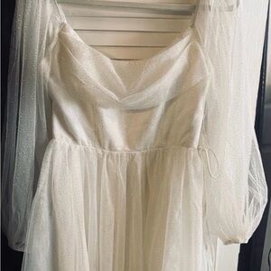 Elegant Long Sleeve Cream Dress with Sheer Accents